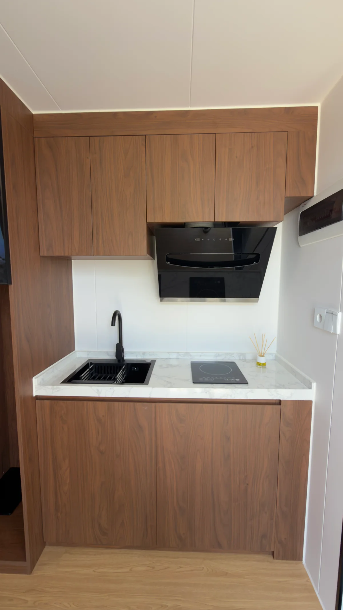 Cocina de una cápsula Sumika